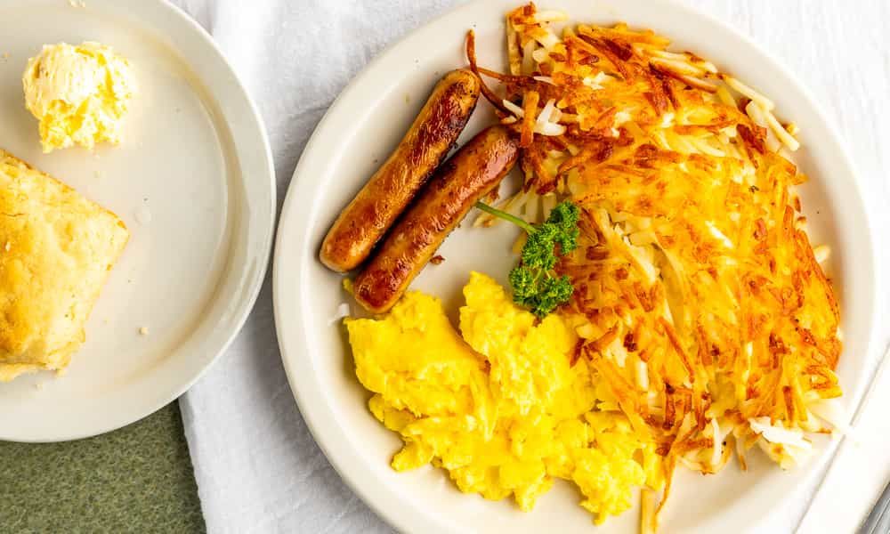 Classic breakfast plate with eggs, potatoes, and morning favorites